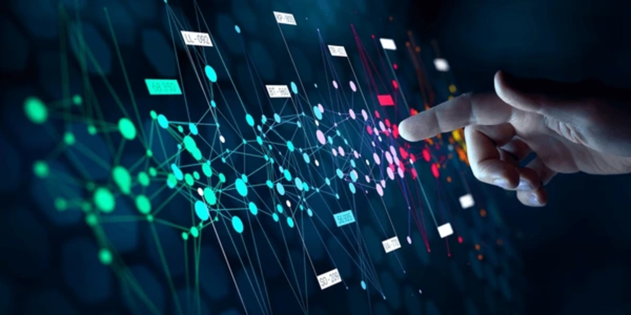 A hand interacts with a digital network of colorful nodes and connecting lines, symbolizing data exchange and technology.