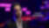A person in a suit with neon text, "Cusp of profitability."